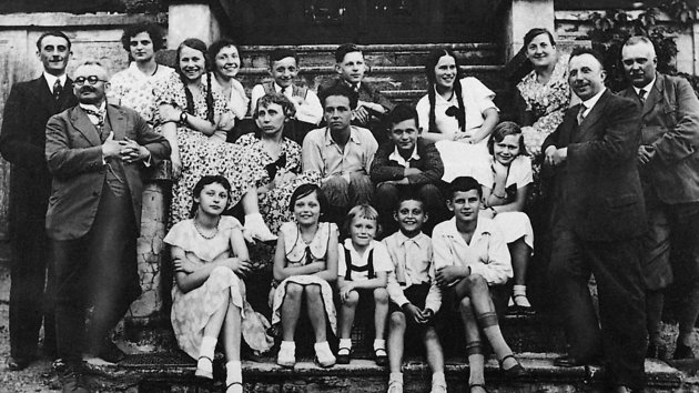 The Donimirski family gathered on the steps of their estate